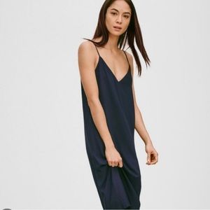 Babaton black slip dress.